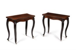 Y A pair of Victorian rosewood serpentine folding card tables