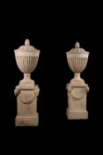 A pair of fine George III artificial 'Coade Stone' urn finials