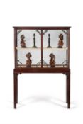 A George III mahogany cabinet on stand