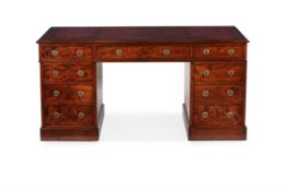 A George IV mahogany pedestal desk