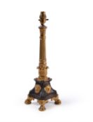 A George IV patinated and parcel gilt bronze table lamp in the manner of William Bullock, circa 1825