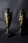 A pair of French parcel gilt and patinated bronze Neo Grec vases, circa 1870