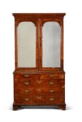 A George I walnut and feather banded cabinet on chest