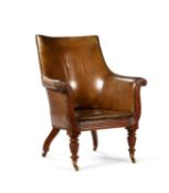 A George IV mahogany and leather upholstered library chair, circa 1825