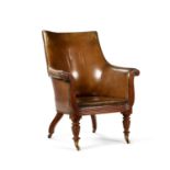 A George IV mahogany and leather upholstered library chair, circa 1825