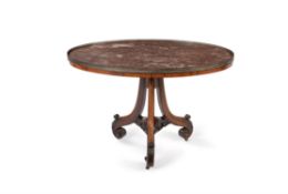 Y A George IV rosewood, marble topped and brass mounted oval centre table
