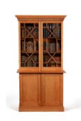 An oak cabinet bookcase, in George III style, probably first half 20th century