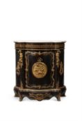 A Napoleon III ebonised and gilt metal mounted serpentine fronted side cabinet