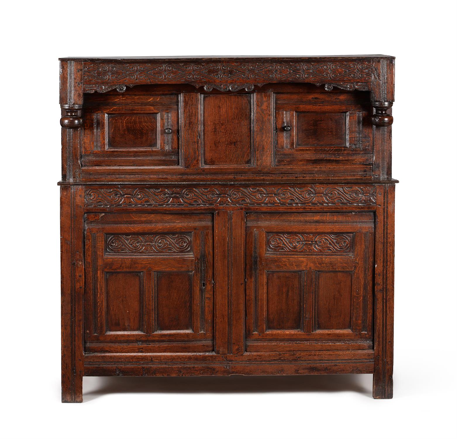 A Charles II oak press or 'court' cupboard, circa 1680