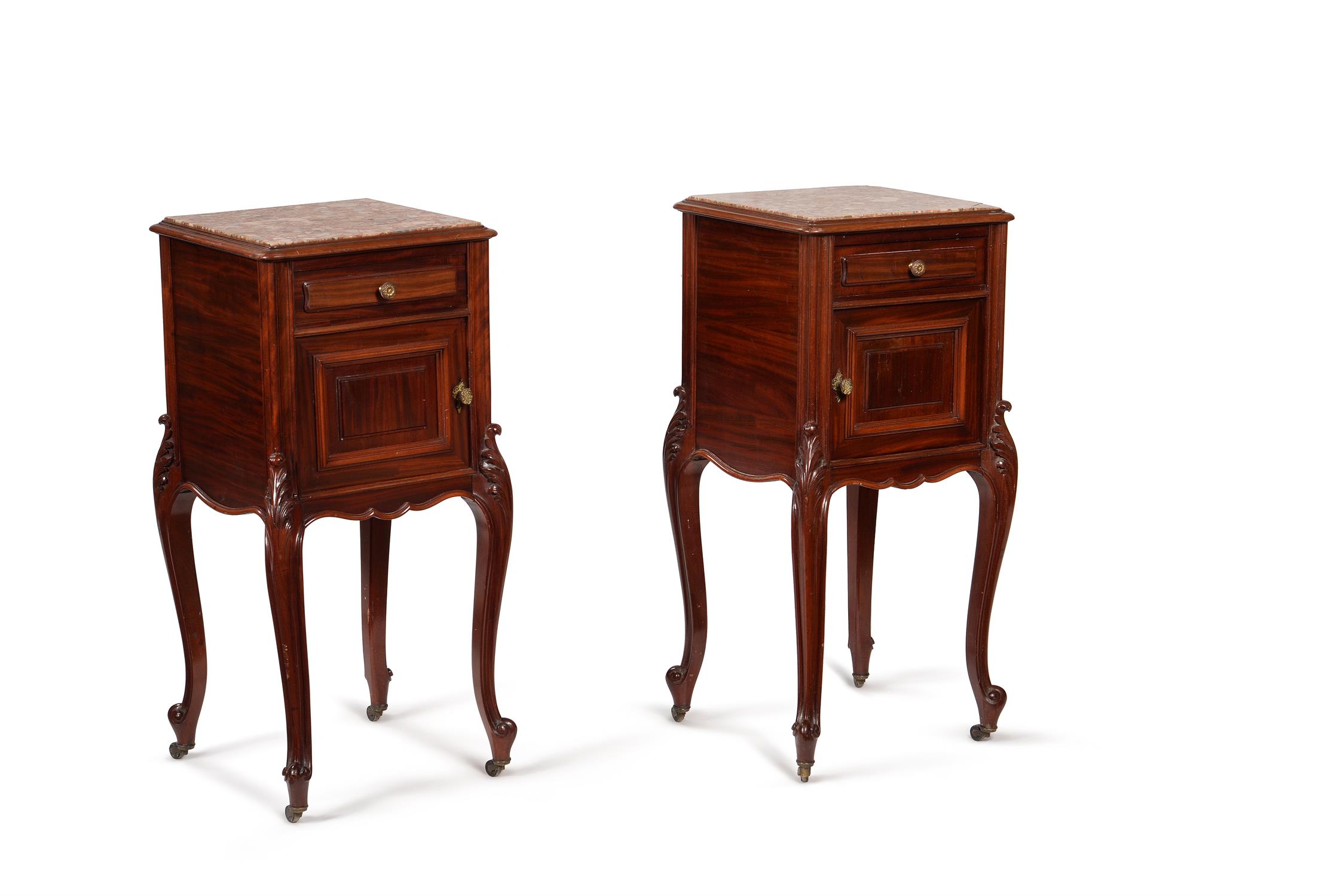 A pair of French mahogany bedside cabinets, late 19th/early 20th century