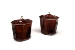 A closely matched pair mahogany and brass mounted wine coolers