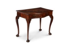 A George II mahogany serpentine fronted side table