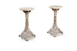 A pair of Victorian cast iron and marble topped tables