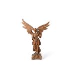 A large Austrian or Bavarian sculpted limewood model of an Angel, mid-18th century