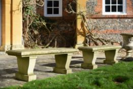 A pair of stone garden benches in Neoclassical style, 20th century