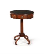 A Regency mahogany drum occasional table