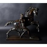 A French patinated bronze group of an Amazon and her horse