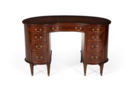 A late Victorian mahogany kidney shaped desk