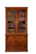 An early Victorian burr oak bookcase, circa 1845, stamped 'JOHNSTONE & JEANES'