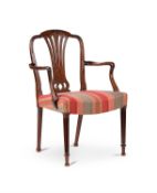 A George III mahogany open armchair