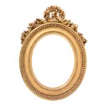 A Louis XVI carved giltwood frame