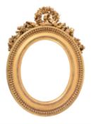 A Louis XVI carved giltwood frame