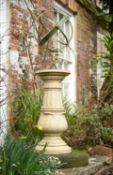 A metal, cast iron and stone mounted armillary sphere