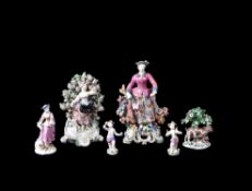 An assortment of mostly Bow porcelain polychrome figures and animals