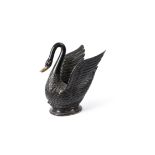 A large and unusual carved and ebonised wood model of a swan, 20th century