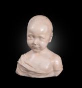 An Italian sculpted white marble portrait bust of a young boy