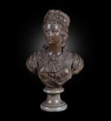 A fine French stained terracotta portrait bust of a young woman, dated 1789