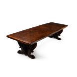 An elm and walnut dining table, of refectory type, in 17th century Italian style