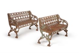 A pair of cast iron Gothic Revival garden benches