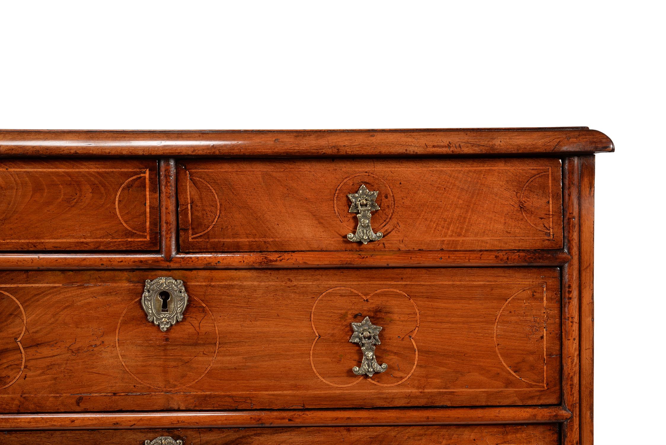 A walnut and fruitwood inlaid chest of drawers, circa 1700 and later - Image 4 of 4