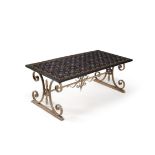 A Pietre Dure decorated marble table top ona wrought iron base