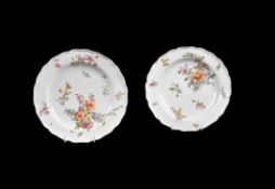 A pair of Chelsea porcelain polychrome plates