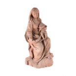 A French or Flemish terracotta group of the Virgin and Child enthroned