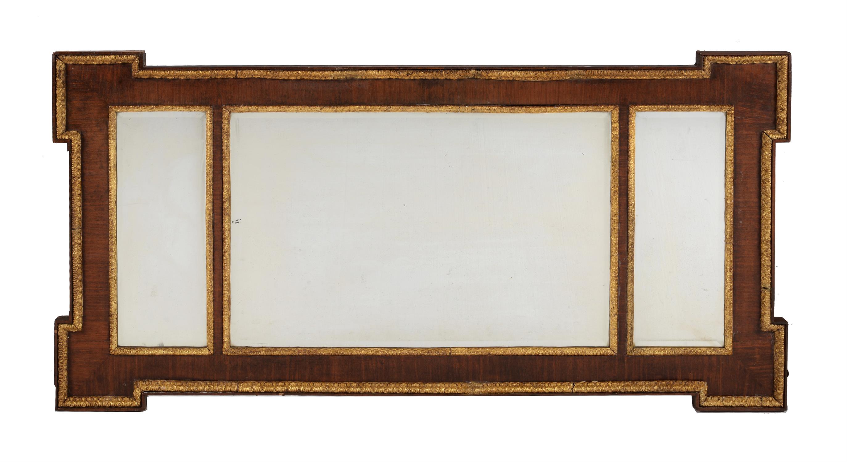 A exotic wood and parcel giltwood wall mirror, 19th century or earlier