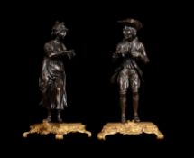A pair of French bronze models of peddlers