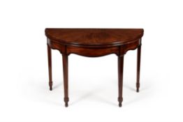 A George III mahogany and burr yew inlaid folding tea table