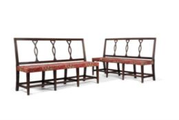 A pair of George III mahogany hall benches