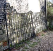 A pair of black painted cast and wrought iron gates, early 20th century