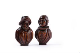 A pair of Flemish sculpted boxwood busts of a man and woman, 18th century