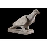 A monumental sculpted white marble model of a perched parrot or eagle