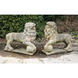 A pair of large stone composition models of lions