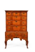 A George II walnut and oak chest on stand