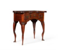 A George I exotic hardwood tea table