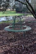 A large Regency green painted wrought iron circular garden or tree seat
