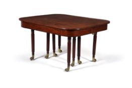 A Regency mahogany concertina action extending dining table