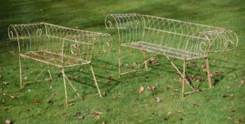 A pair of wirework garden benches